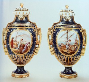 Figure 7: “Pair of Vases and Covers; Vase à Panneaux”, Date: c. 1766-1770, Culture: Sèvres, France, Material: Soft-paste Sévres porcelain, dark blue ground (Bleu Nouveau), painted by Jean-louis Morin (who used the lower case ‘m’ as his signature) in the late 1760’s or early 1770’s. Measurements: Heights: 30.5, Widths: 17.5 and 17.6, Depths: 13.8 and 13.9.